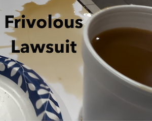 Spilled coffee on a table, reflecting the mess of a frivolous lawsuit in PA
