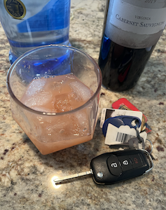 A bottle of vodka, wine, and vehicle key, regarding limited tort exception for drunk driving 