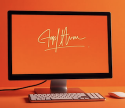 A desktop computer revealing an electronic signature with an orange background 